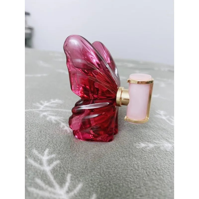 LA Bom. b.A 2.7oz female perfume, fresh flower and fruit fragrance, dragon fruit integration, unique butterfly design
